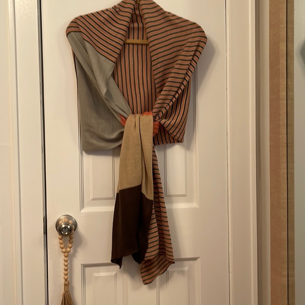 Multi colored light knit scarf/wrap.